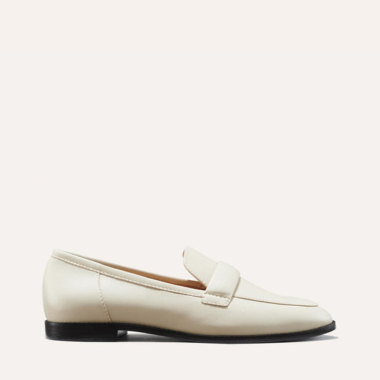 Margaux's structured Andie Loafer, made in a soft, ecru Italian nappa leather with a plush, padded keeper