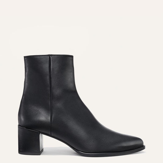 Margaux's classic Downtown Boot in black leather with a comfortable block heel and pointed toe