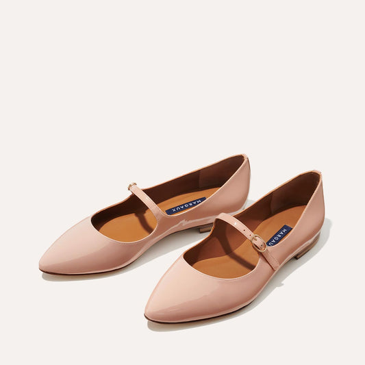 Margaux's classic and comfortable Mary Jane ballet flat, made in Spain from shiny, rose pink Italian patent leather