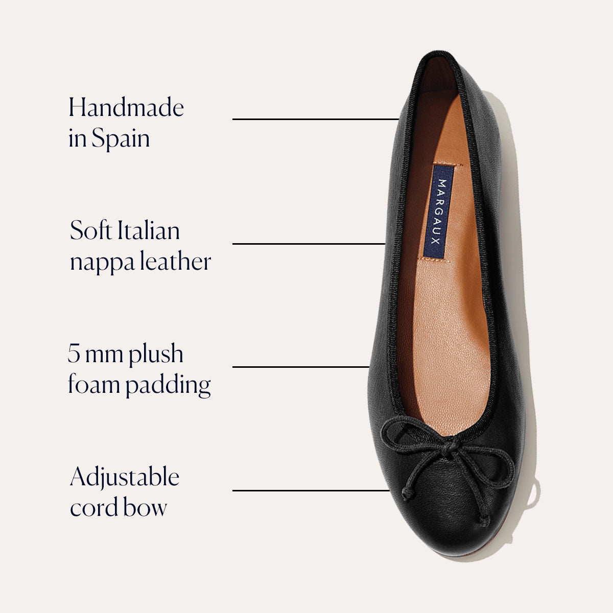 The Demi - Black Nappa by margaux-development is a handmade ballet flat in soft Italian nappa leather, featuring 5mm plush foam padding and an adjustable cord bow at the toe—crafted in Spain.