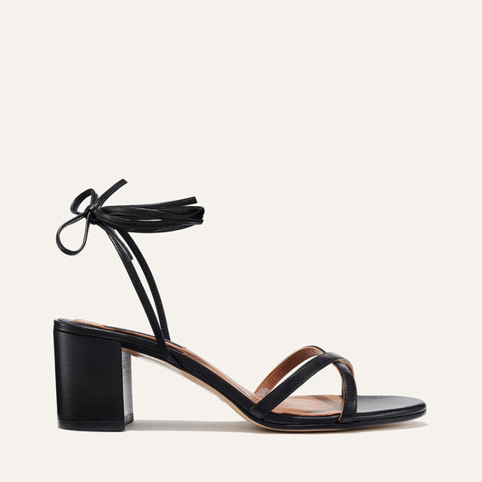 Margaux's strappy Soho Sandal with ankle ties, made in Spain from soft, black Italian nappa leather and a walkable block heel 