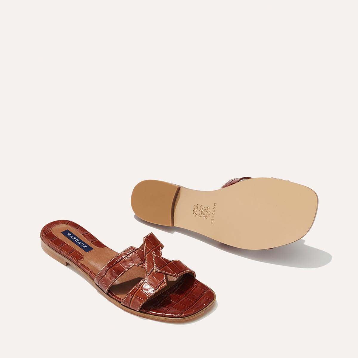 The MX Sandal in Mahogany, a slip-on sandal featuring croc-embossed Italian calf leather with structured straps and a subtly square toe.
