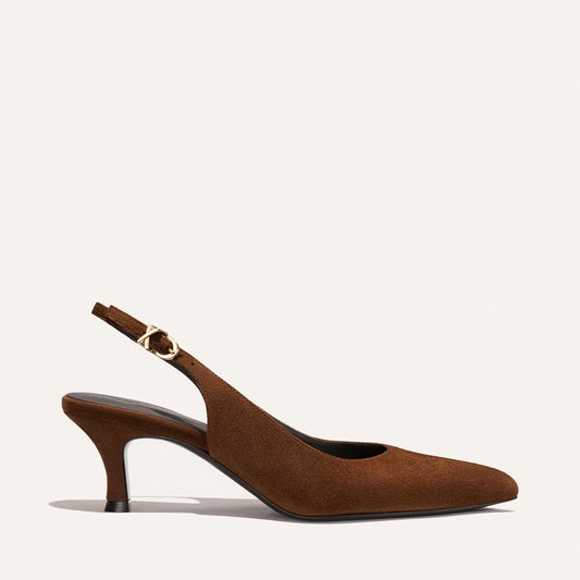 The Colette - Ganache Suede by Margaux is a brown suede slingback heel featuring a snip-nose pointed toe and a small buckle on the strap, displayed against a plain light background.