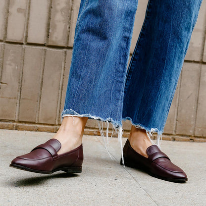 The Andie Loafer in Burgundy Nappa, featuring a sleek structured design made from smooth Italian nappa leather with a minimalistic padded keeper detail.