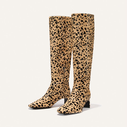 The Brera Knee-High Boot - Tan Cheetah Haircalf in tan with a black cheetah print pattern and a walkable low block heel.