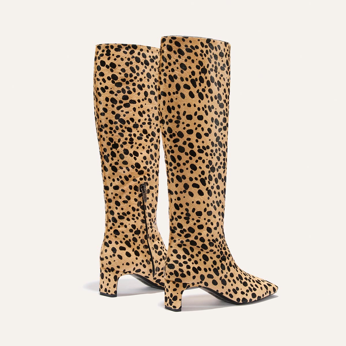 The Brera Knee-High Boot - Tan Cheetah Haircalf, featuring a walkable low block heel and a padded insole.
