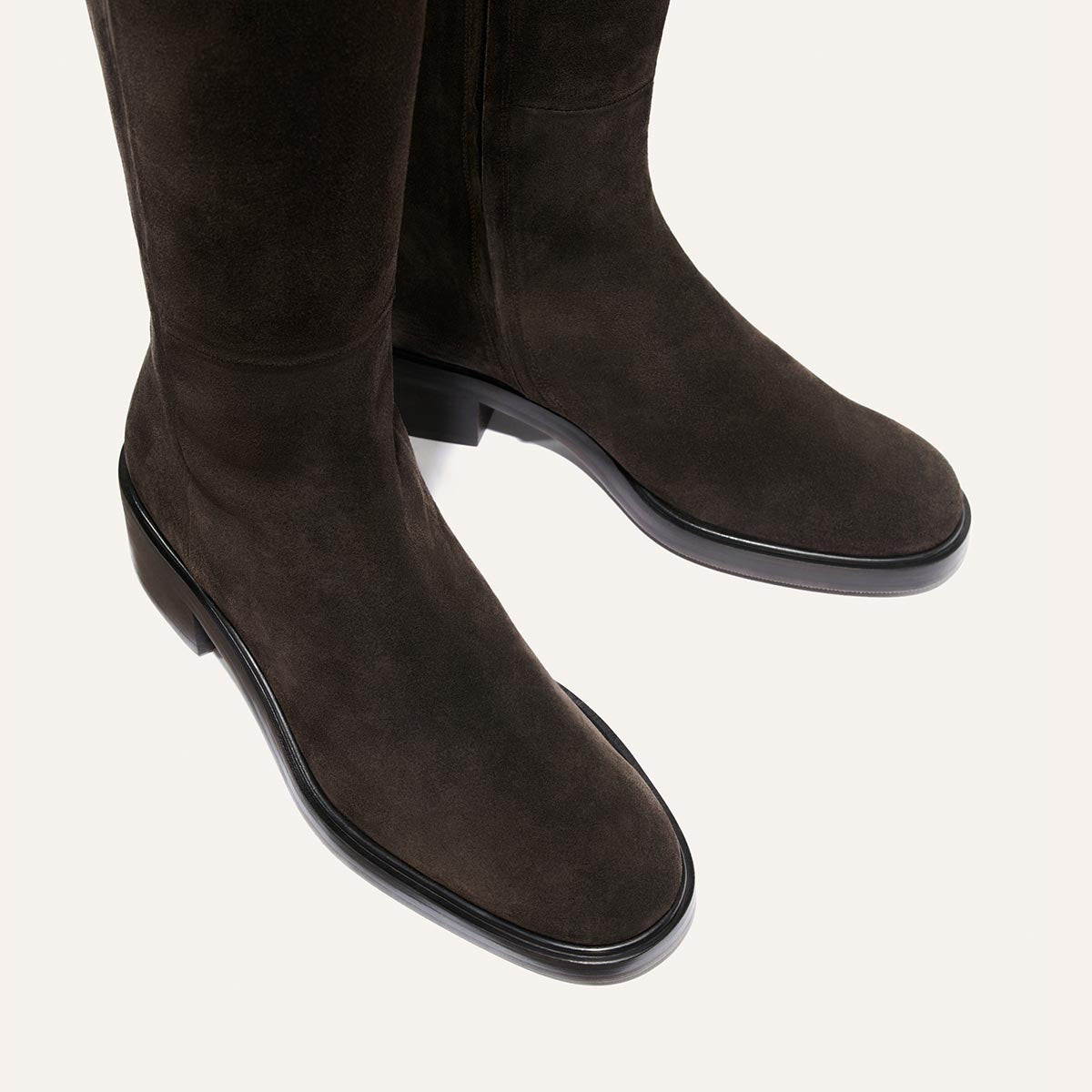 The City Boot - Dark Chocolate Suede riding boots in dark brown suede with a classic silhouette, low heels, and rounded toes.