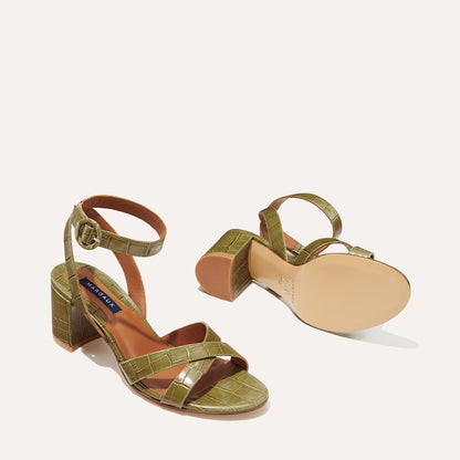 Margaux's classic City Sandal in olive green croc embossed leather with comfortable straps and a walkable block heel