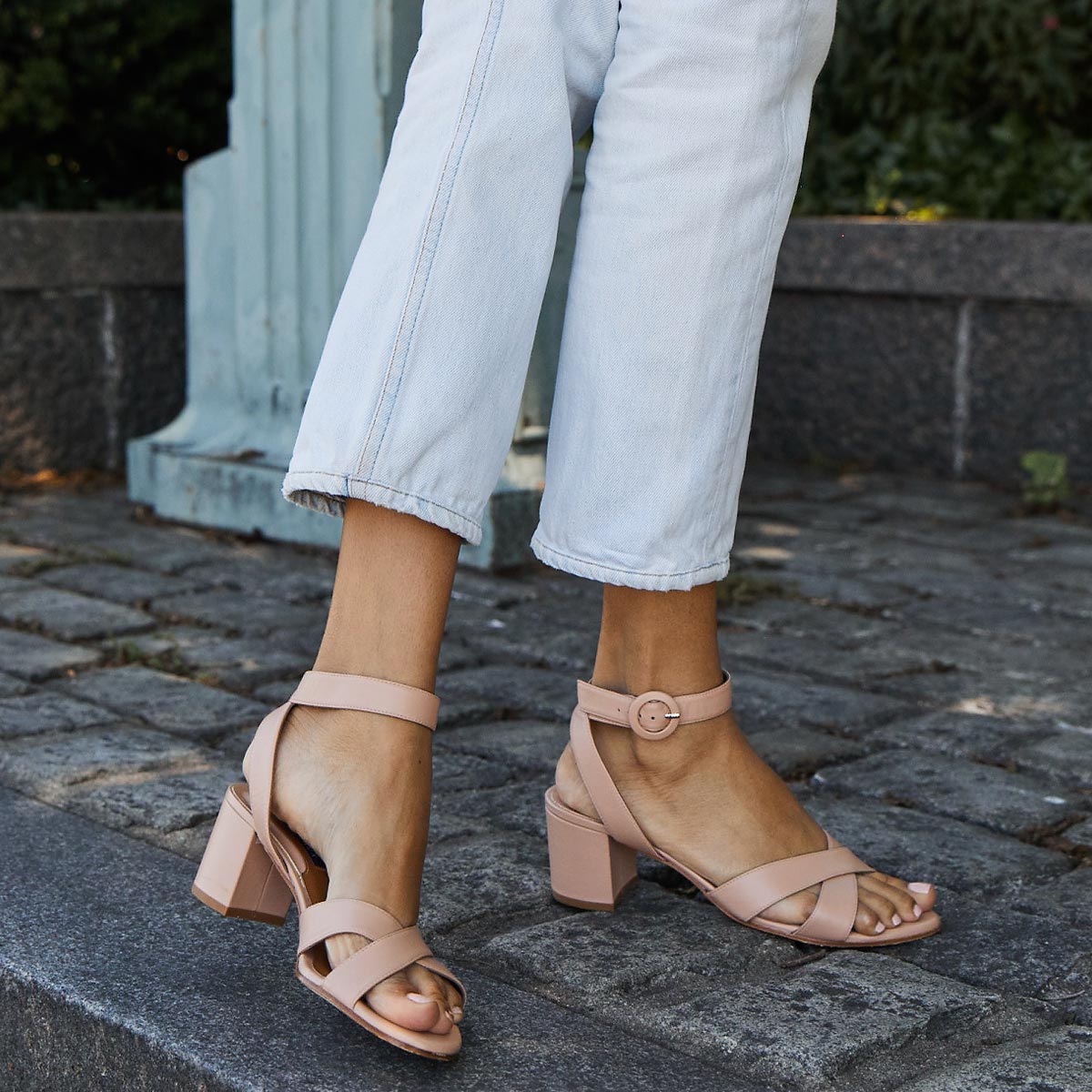 The City Sandal in Rose Nappa, featuring carefully placed straps, and adjustable ankle strap and a comfortable 2.5-inch block heel.