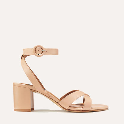 The City Sandal in Rose Nappa, featuring carefully placed straps, and adjustable ankle strap and a comfortable 2.5-inch block heel.
