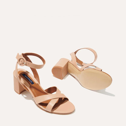 The City Sandal in Rose Nappa, featuring carefully placed straps, and adjustable ankle strap and a comfortable 2.5-inch block heel.