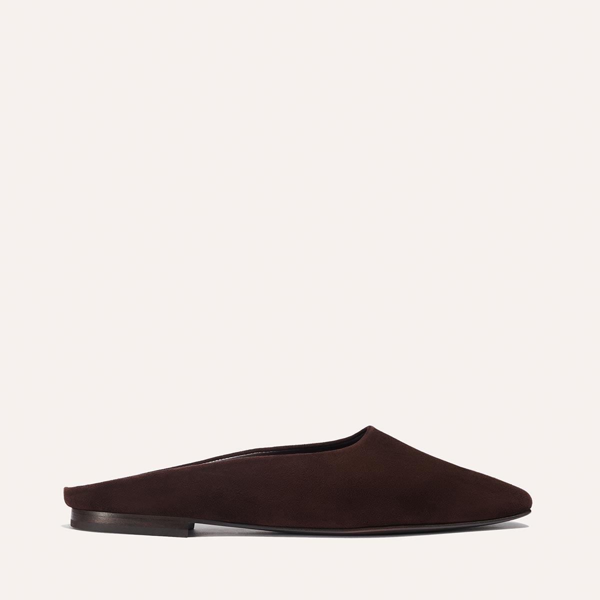 The Margaux Alex Mill x Margaux: The Clara - Espresso Suede is a single dark brown, backless suede slipper with a flat sole and slipper silhouette, shown in profile against a plain light background.