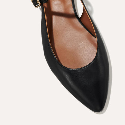 The Cluny Slingback in Black Nappa, a ballet flat with a pointed toe, a slingback strap and an adjustable strap across the top of the foot for a secure fit.