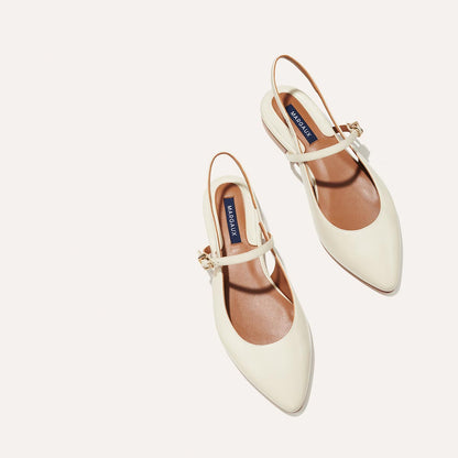 The Cluny Slingback in Ecru Nappa, a ballet flat with a pointed toe, a slingback strap and an adjustable strap across the top of the foot for a secure fit.
