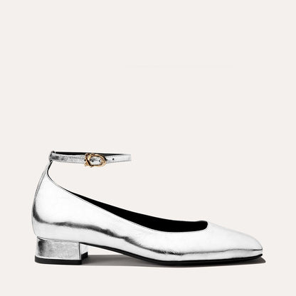 The Daphne in shiny Silver Crinkle Mirror, featuring a chic square toe, a supportive ankle strap and a versatile 1-inch block heel,