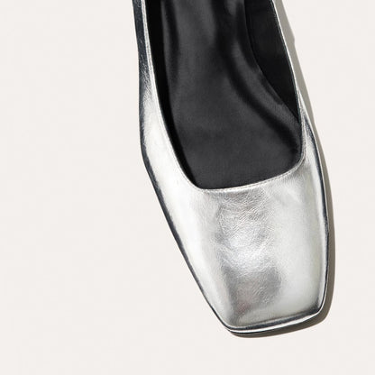 The Daphne in shiny Silver Crinkle Mirror, featuring a chic square toe, a supportive ankle strap and a versatile 1-inch block heel,