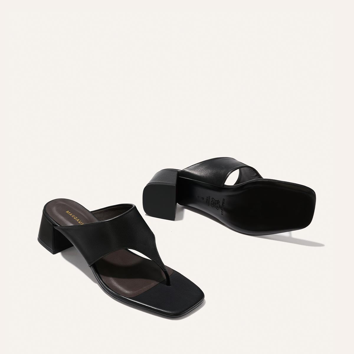 Black sandals on a white background