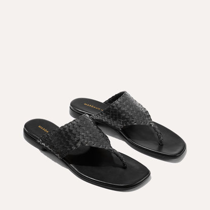 Black woven leather thong sandals