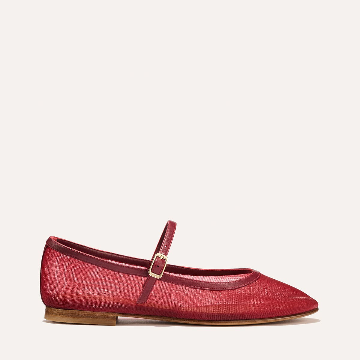 The Demi Jane in Crimson Mesh, a sheer ballet flat with a rounded toe and an adjustable strap for a secure fit.