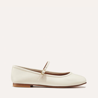 The Demi Jane in Ecru Nappa, a ballet flat with a rounded toe and an adjustable strap for a secure fit.