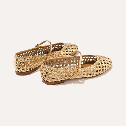 The Demi Jane - Gold Woven Leather by margaux-development: gold handwoven leather ballet flats featuring a closed toe, Mary Jane strap, cushioned insole, and low wooden heel, shown on a plain light background.