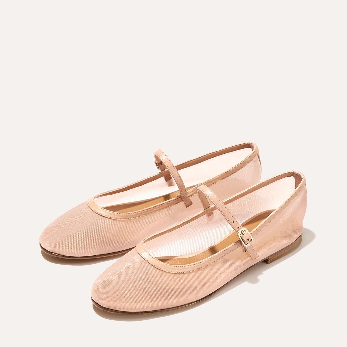 The Demi Jane in Rose Mesh, a ballet flat with a rounded toe and an adjustable strap for a secure fit.