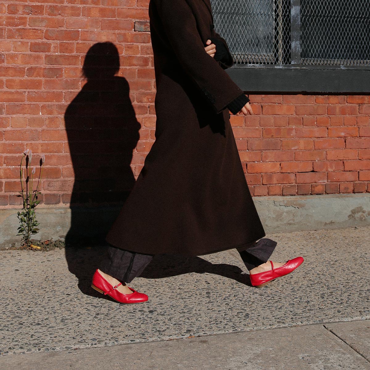 The Demi Jane in buttery soft Scarlet Nappa, a ballet flat with a rounded toe and an adjustable strap for a secure fit.