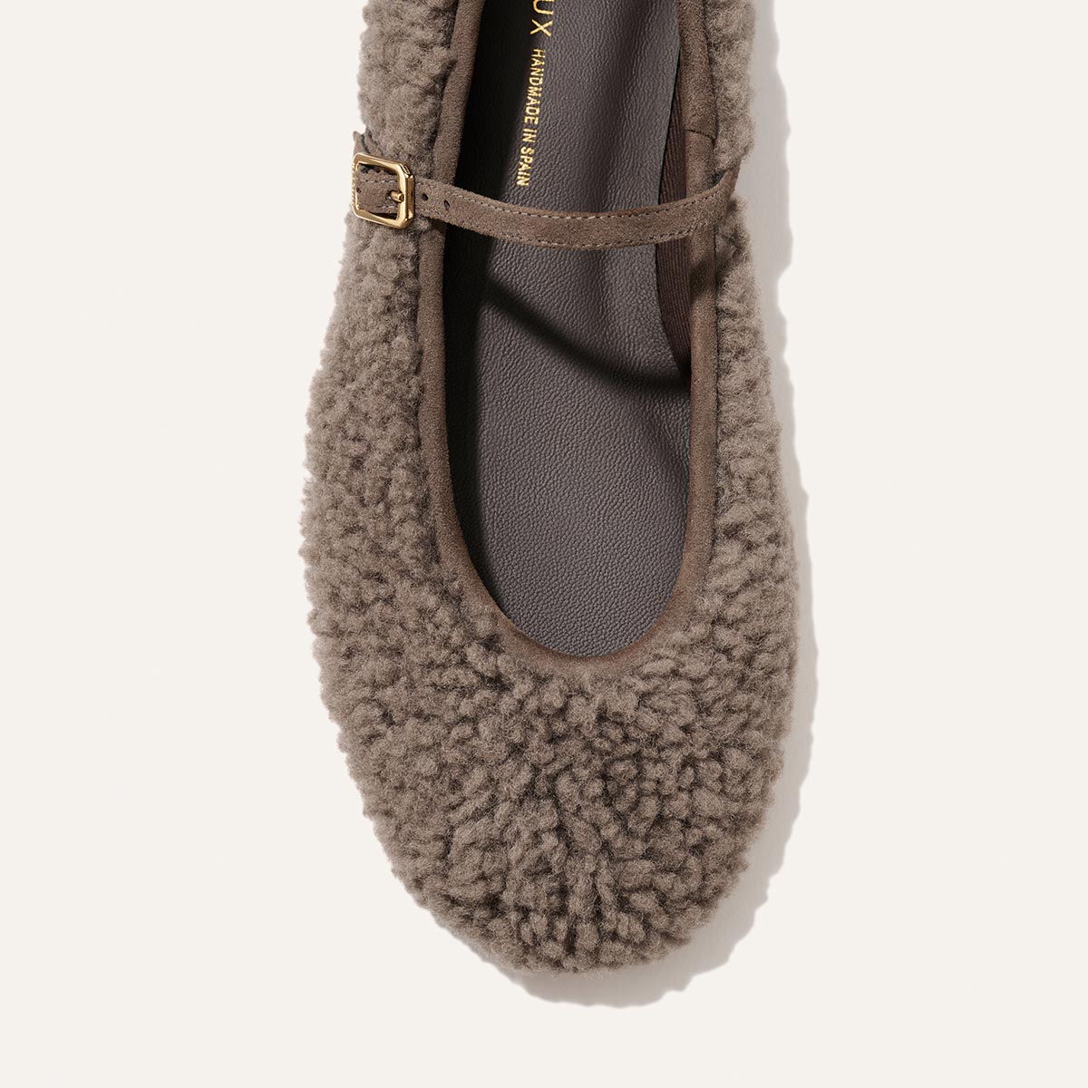 The Demi Jane - Taupe Shearling flat with an elegant thin buckled strap.