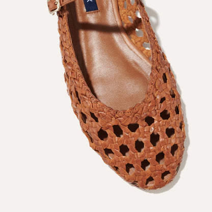 The Demi Jane in Saddle Nappa, a ballet flat with a rounded toe and an adjustable strap for a secure fit.