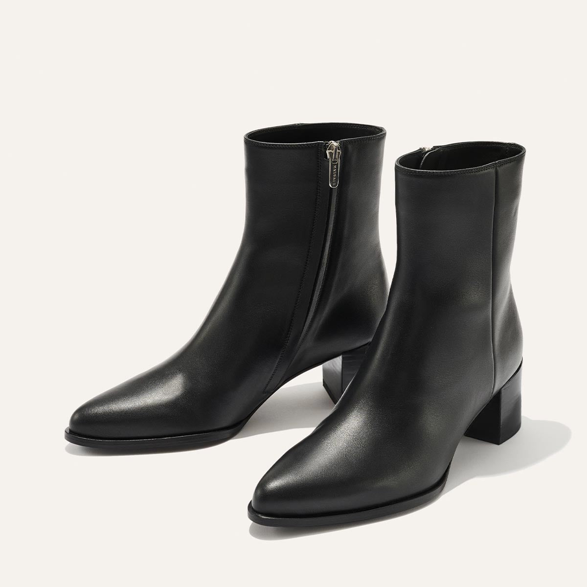 The Downtown Boot in Black Calf, a chic ankle-height design complete with a Western-inspired welt and a comfortable 2.5-inch stacked heel.