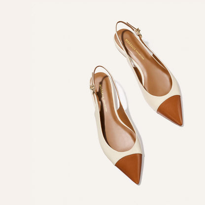 The Elise by margaux-development: women’s cream cotton and saddle nappa pointed-toe slingback flats with brown toe caps and gold buckle straps, shown on a light background.