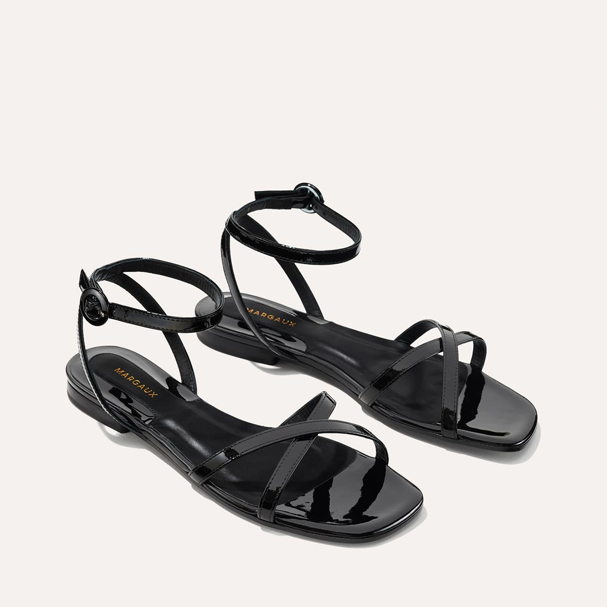 The Flat Sandal Black Patent Margaux