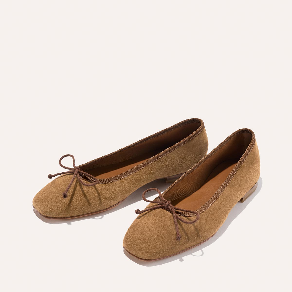Margaux The Fonteyn - Cedar Suede ballet flats in chic tan suede with a square toe and a thin front bow detail for a comfort-first fit.