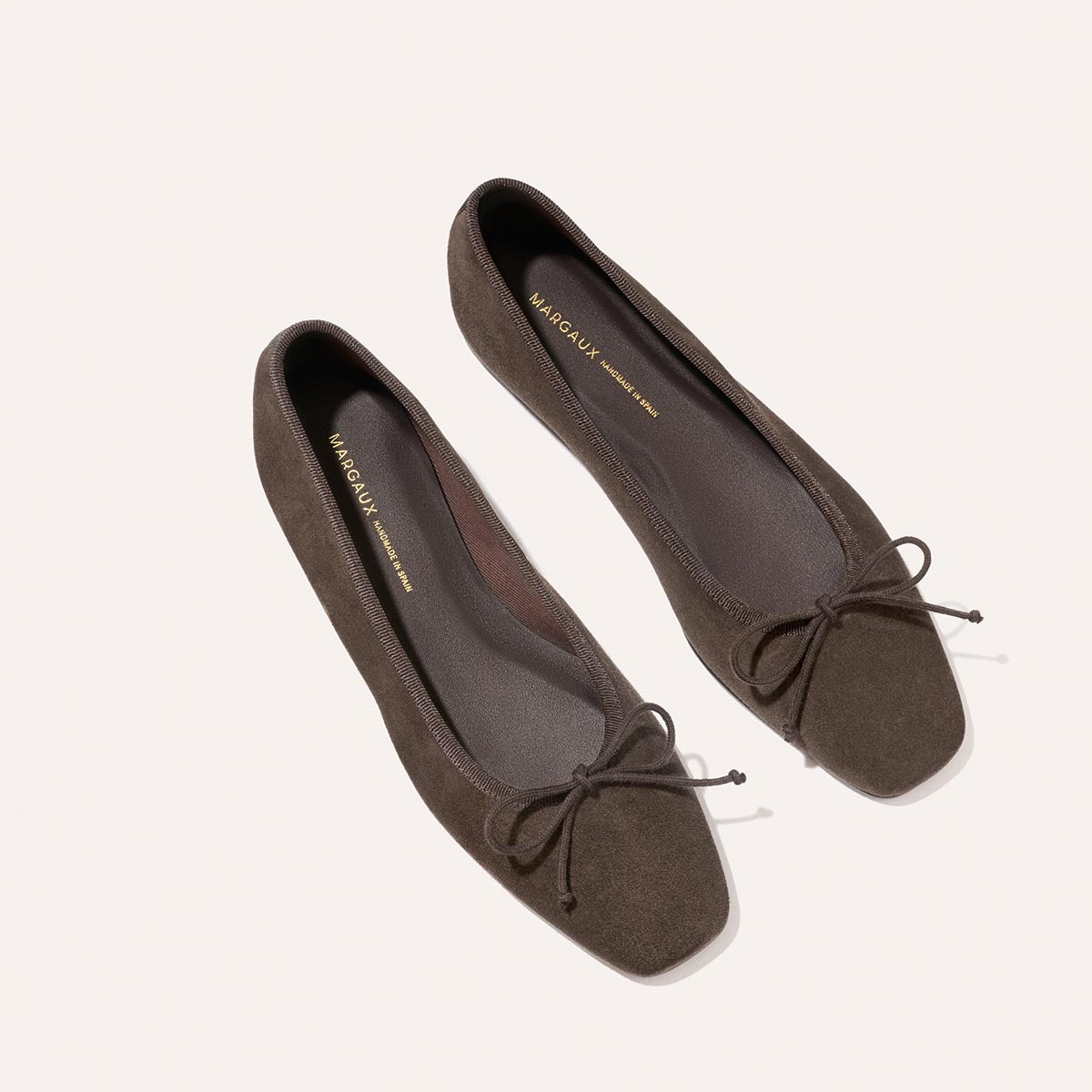 Margaux The Fonteyn - English Brown Suede ballet flats feature a chic square toe and a small bow on the vamp for a comfort-first fit.