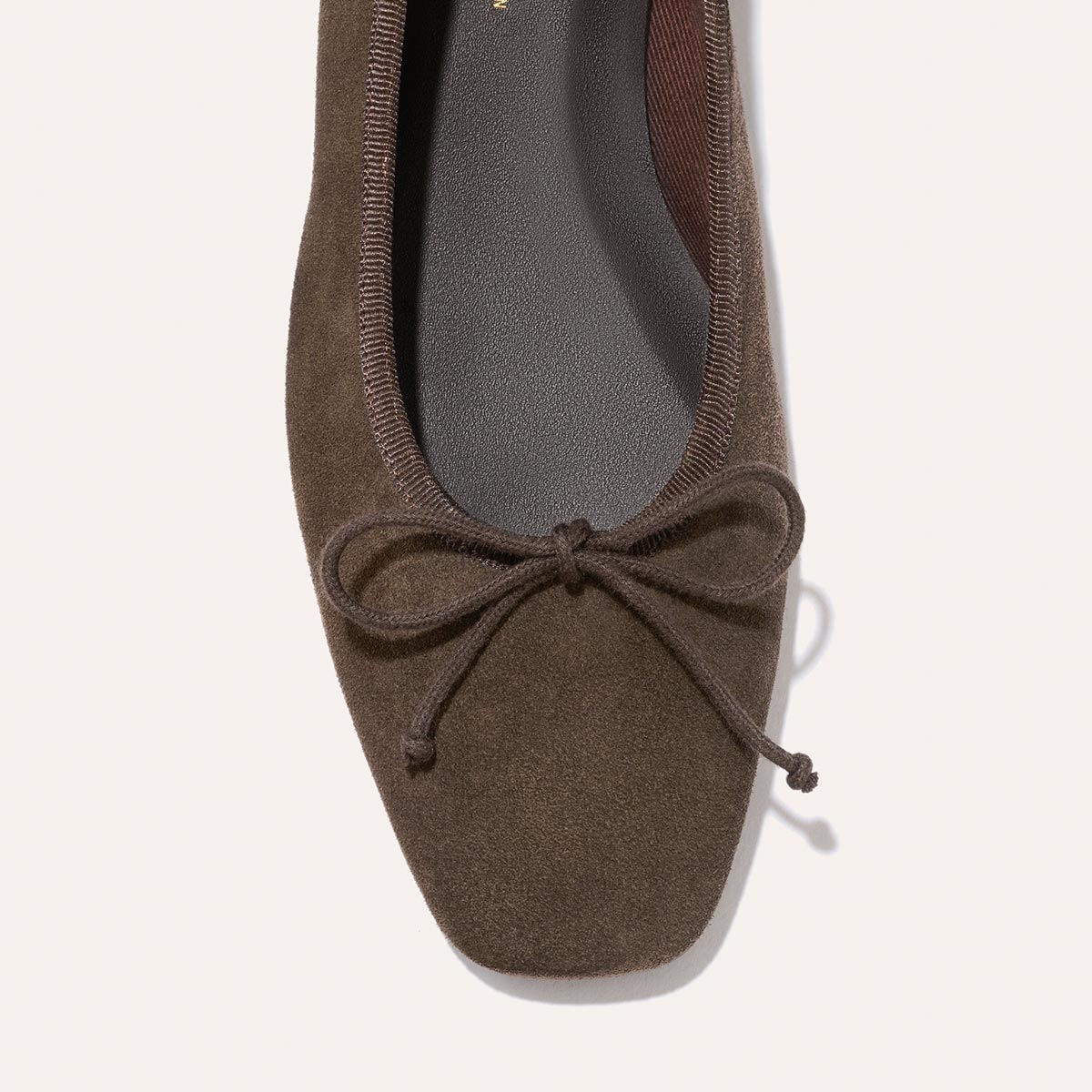 Top view of The Fonteyn – English Brown Suede, a handcrafted ballet flat by Margaux featuring a square toe and a bow detail on the front.