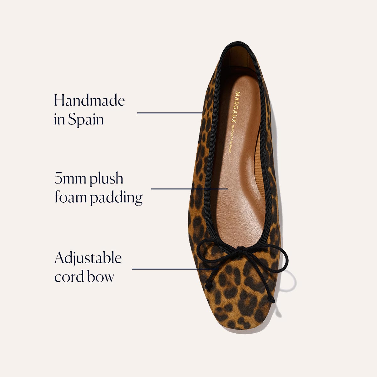 The Fonteyn - Leopard Suede by Margaux is a handcrafted ballet flat made in Spain, featuring leopard print suede, a comfort-focused 5mm plush foam insole, and an adjustable cord bow on the front.