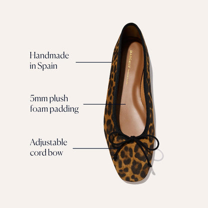 The Fonteyn - Leopard Suede by Margaux is a handcrafted ballet flat made in Spain, featuring leopard print suede, a comfort-focused 5mm plush foam insole, and an adjustable cord bow on the front.