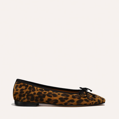 The Fonteyn - Leopard Suede by Margaux: a single leopard-print ballet flat with black trim, rounded toe, small black bow, and low black heel shown on a neutral background.