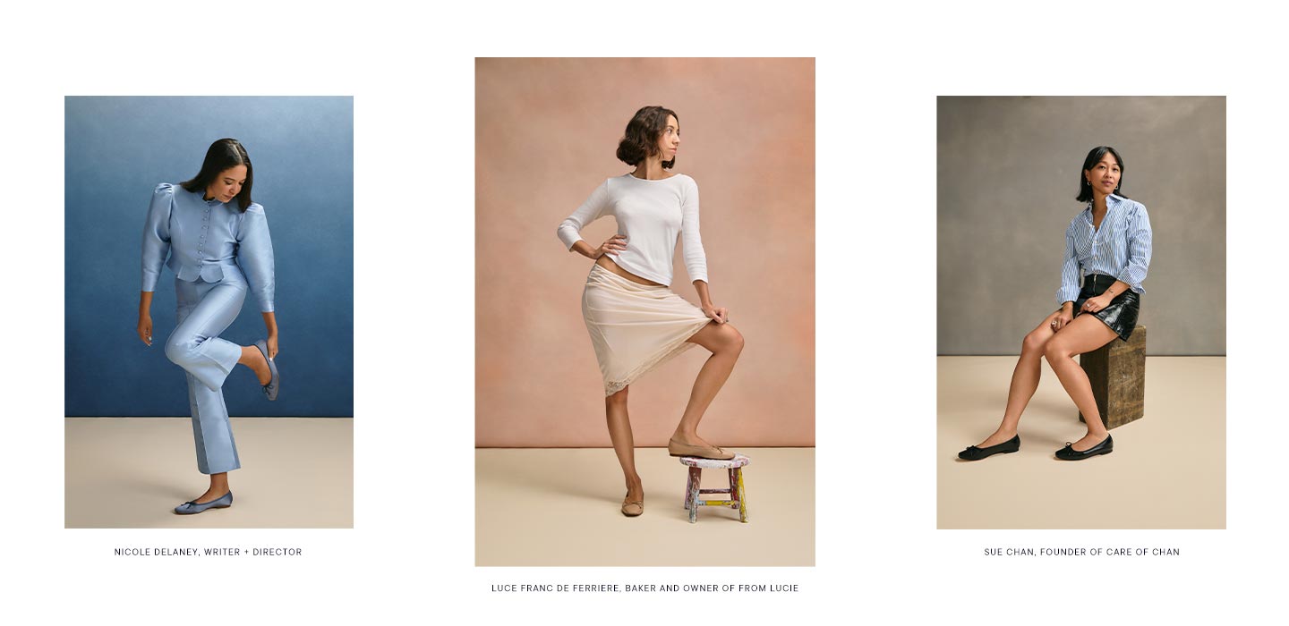 Three women pose individually against plain backdrops: one in a light blue suit adjusts her shoe, one in a white top and beige skirt stands with a foot on a small stool, and one in a blue shirt sits on a wooden box.
