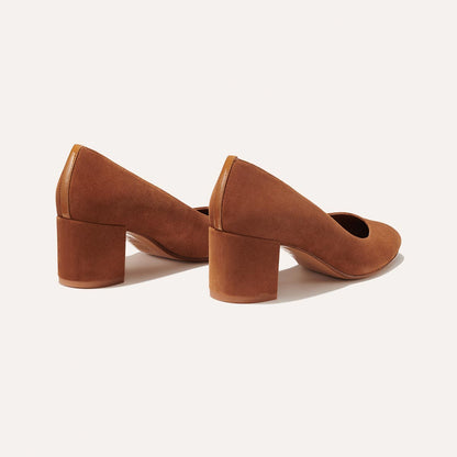 The Heel in Chestnut Suede, a classic block heel featuring a sleek almond toe design complemented by a comfortable 2.5-inch heel.