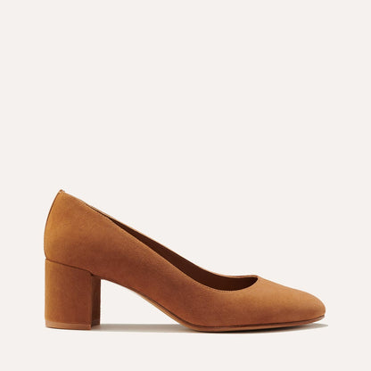 The Heel in Chestnut Suede, a classic block heel featuring a sleek almond toe design complemented by a comfortable 2.5-inch heel.