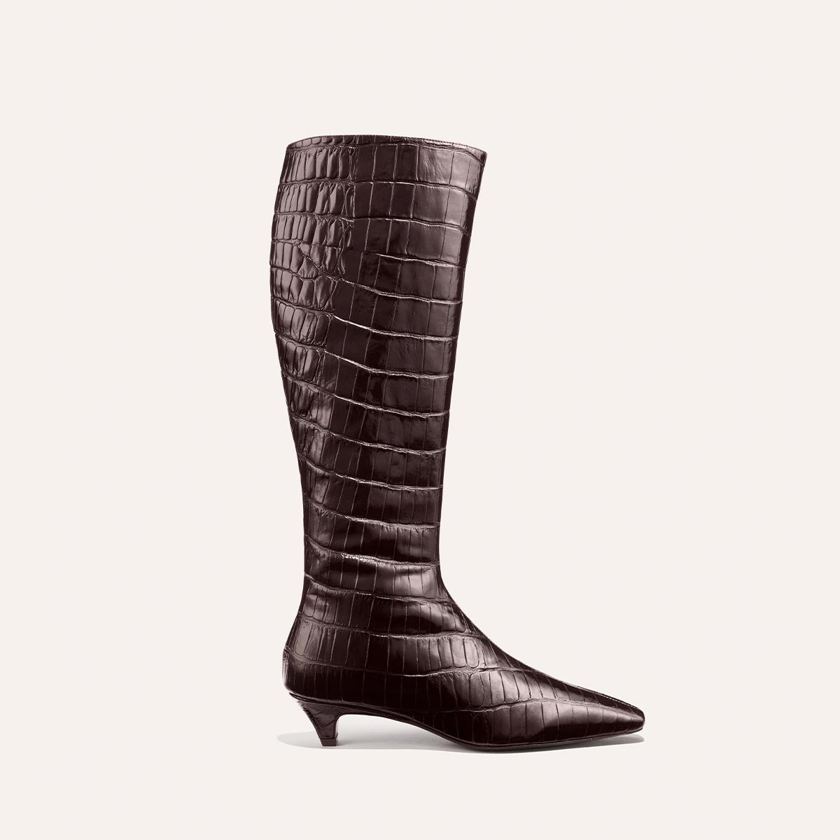 The Imogen - Espresso Croc Embossed by Margaux: a single knee-high, dark brown boot featuring a crocodile pattern, pointed toe, and short kitten heel, displayed on a plain light background.