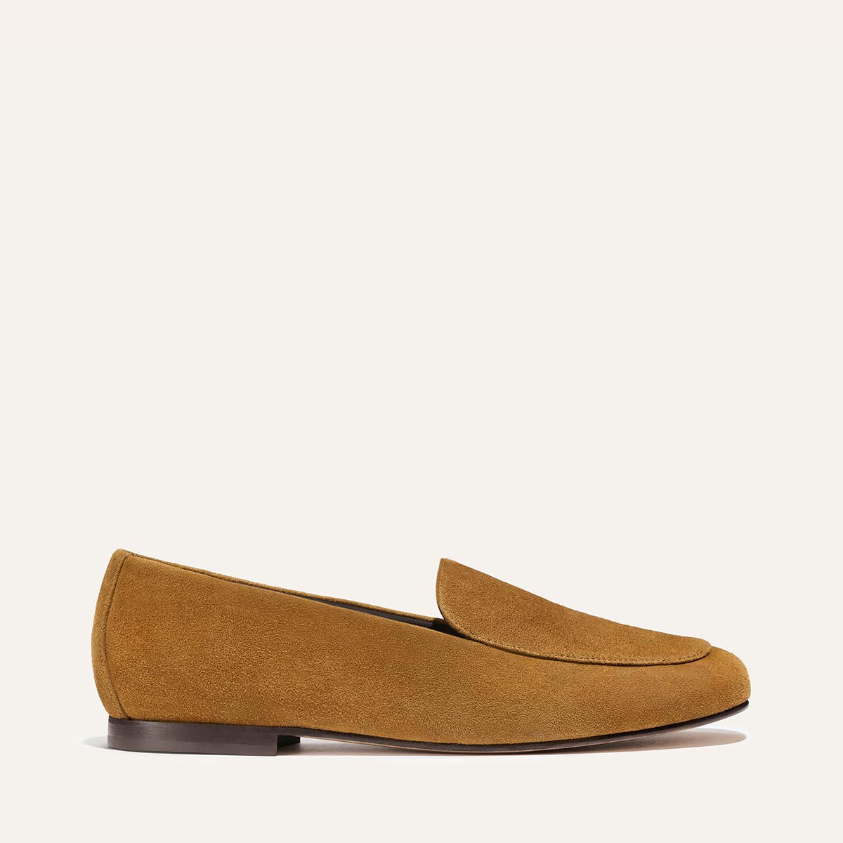 The James Loafer - Cedar Suede by Margaux is shown on a plain light background, positioned to highlight the outer side and its low dark brown heel.