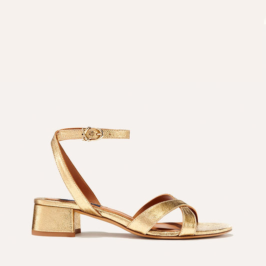 Margaux's classic Lena Sandal in metallic gold nappa leather with comfortable straps and a lower walkable block heel