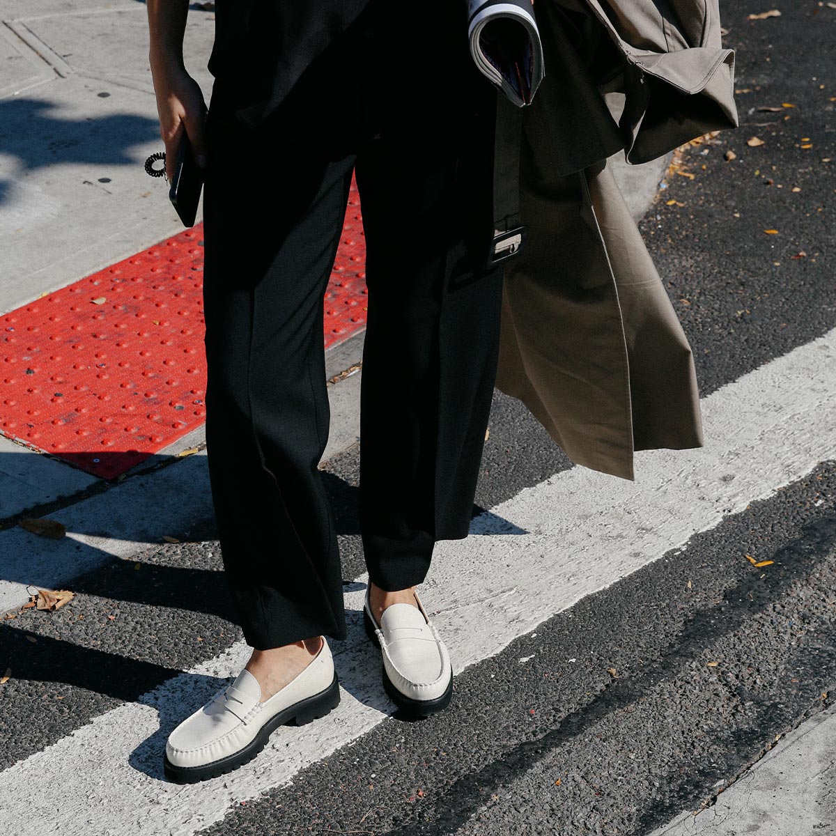 The Louisa Loafer in Cream Calf, a leather penny loafer with chunky lug sole, featuring high-shine abrasivato leather and a lightweight design.