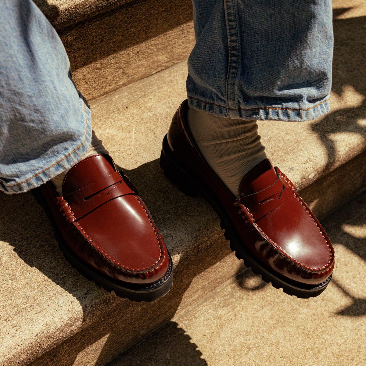 The Louisa Loafer in Hickory Calf, a leather penny loafer with chunky lug sole, featuring high-shine abrasivato leather and a lightweight design.