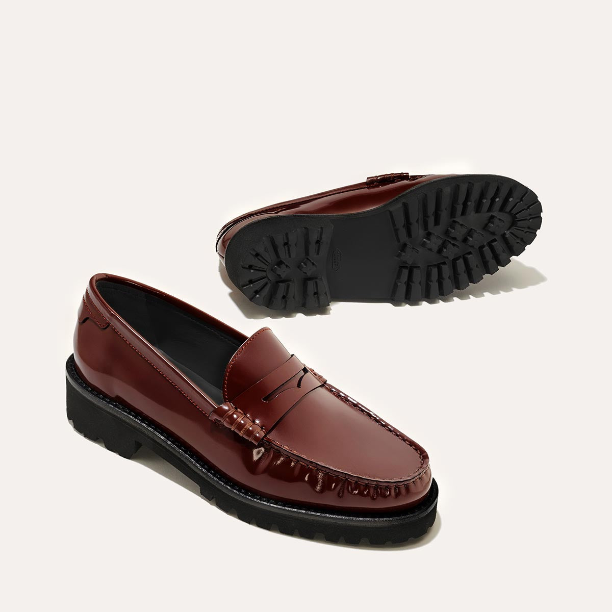 The Louisa Loafer in Hickory Calf, a leather penny loafer with chunky lug sole, featuring high-shine abrasivato leather and a lightweight design.