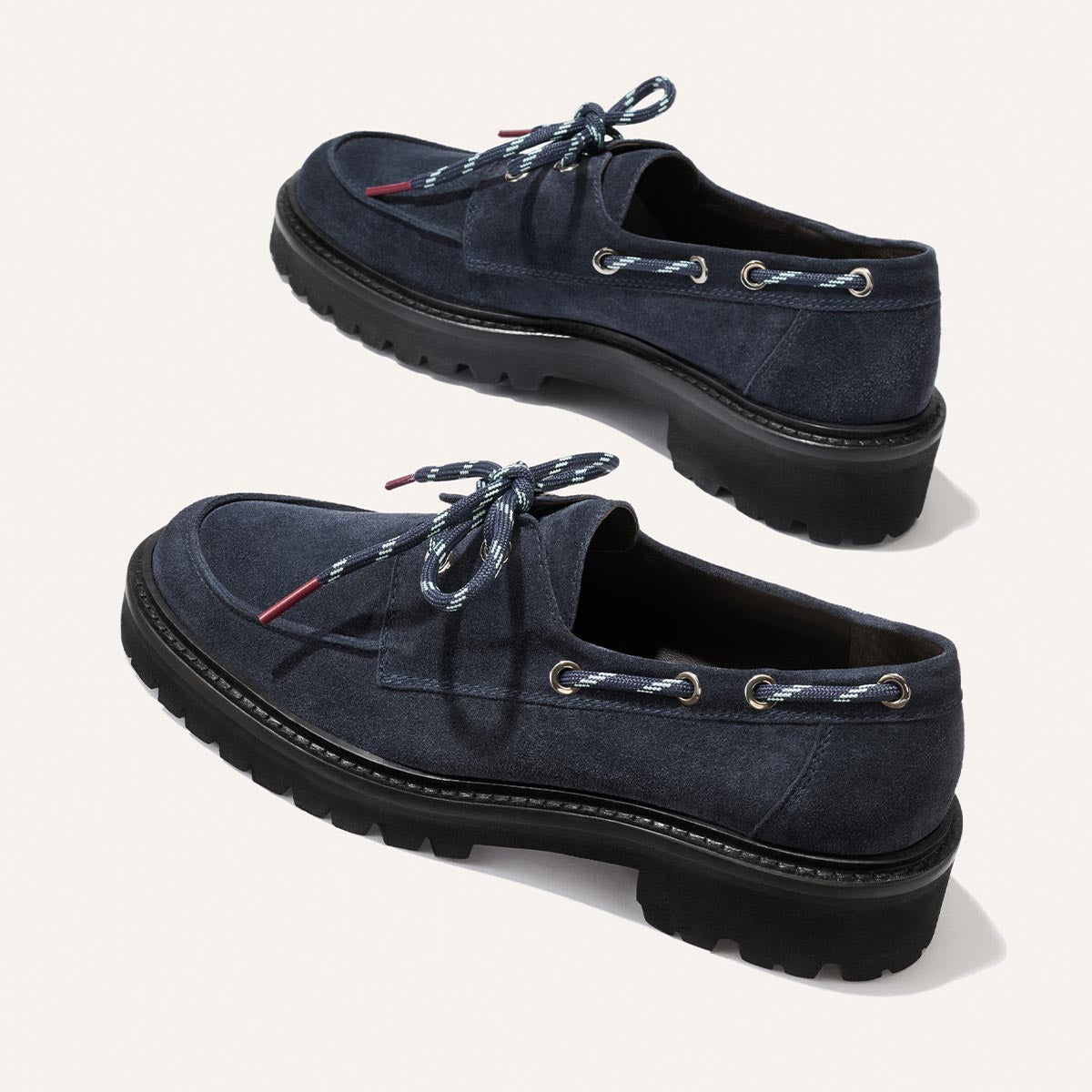 Margaux The Marine Loafer - Vintage Navy Suede boat-shoe loafers in navy blue suede with patterned laces, metal eyelets, and a lightweight lug sole.