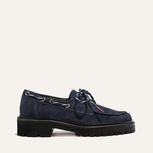 The Marine Loafer - Vintage Navy Suede boat-shoe with metal eyelets, braided laces, and a lightweight lug sole.