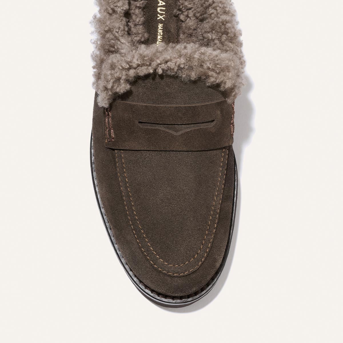 The Marlowe Mule - English Brown Suede and Shearling, a brown suede cozy slide loafer lined with grey shearling.